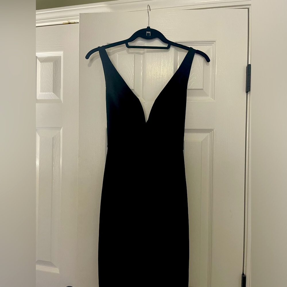 Black bodycon thin strapped open back dress from Blush Mark. Never worn!